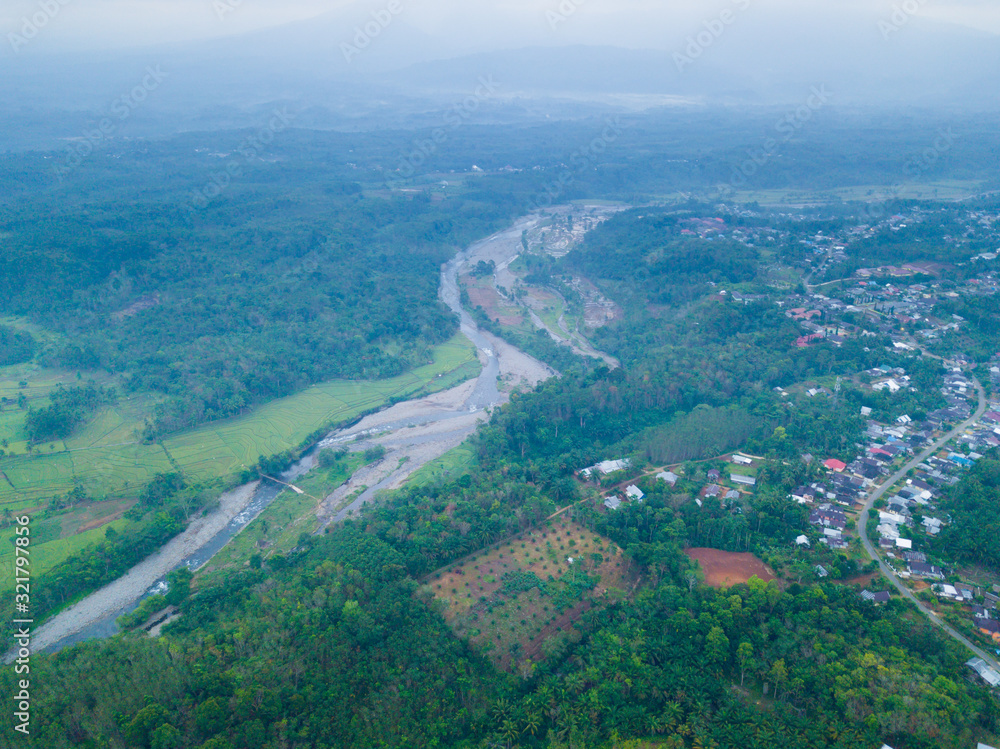 aerial view with river in the morning and mountain range misty