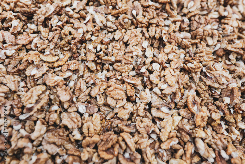 Shallow depth of field (selective focus) image with walnut kernels piled together. Shallow depth of field (selective focus) image with walnut kernels piled together.