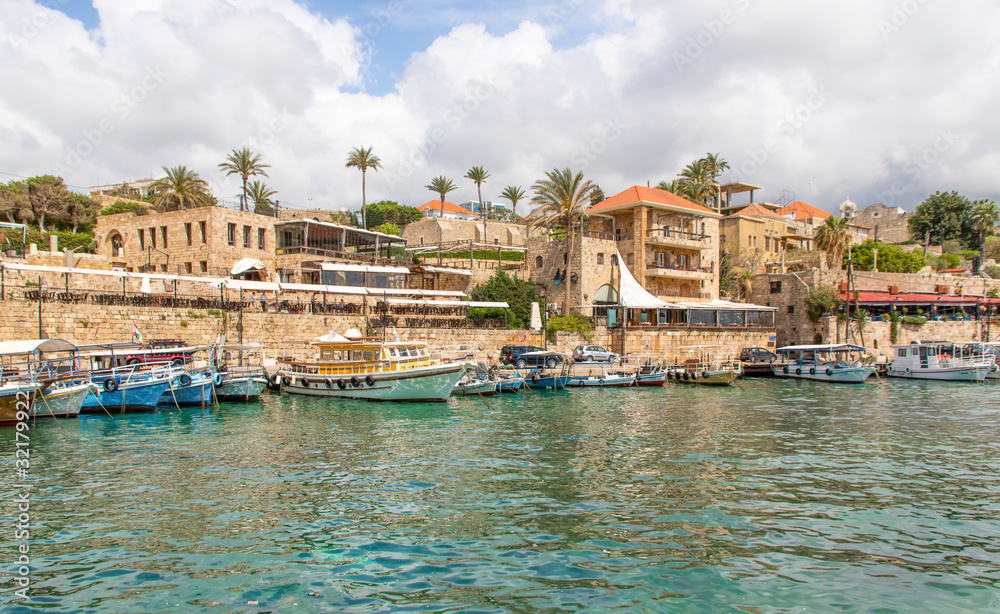 Fototapeta premium Byblos, Lebanon - one of the oldest continuously inhabited cities in the world, and UNESCO World Heritage Site, the Old Town of Byblos displays a wonderful harbour, once used by Romans and Phoenicians