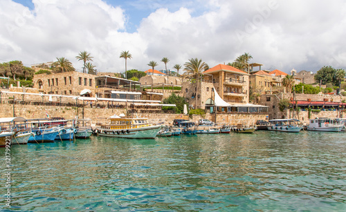 Fototapeta Naklejka Na Ścianę i Meble -  Byblos, Lebanon - one of the oldest continuously inhabited cities in the world, and UNESCO World Heritage Site, the Old Town of Byblos displays a wonderful harbour, once used by Romans and Phoenicians