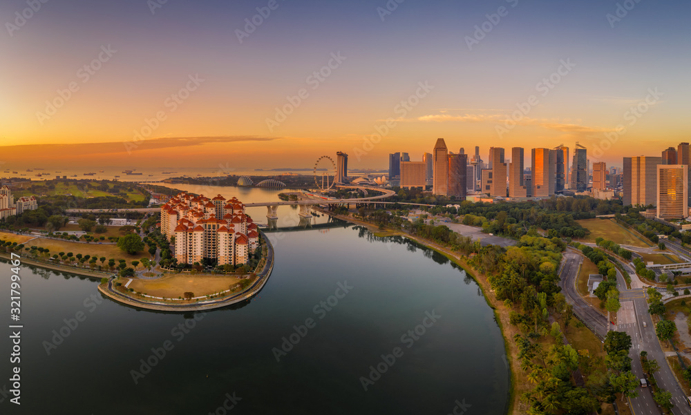 Mar 16/2019 Sunrise at Singapore Sport Hub over looking to central business district - aerial view