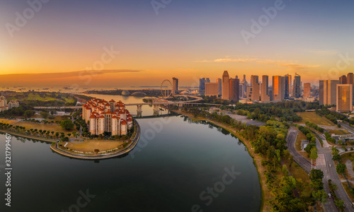 Mar 16/2019 Sunrise at Singapore Sport Hub over looking to central business district - aerial view © Huntergol