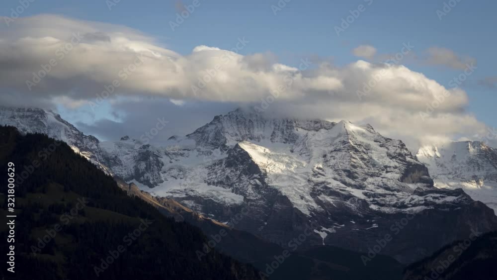 Incredible Panning Time Lapse of Snow Capped Alpine Mountains Incredible Panning Time Lapse of Snow Capped Alpine Mountains
