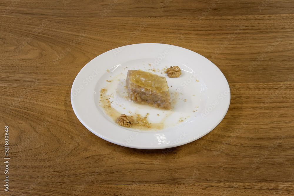 Restaurant cakes served on the wooden table, top view. Restaurant cakes served on the wooden table, top view.