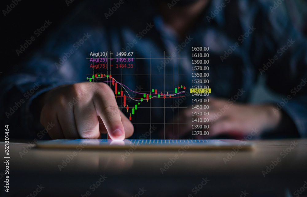 Businessman playing tablet and showing a growing of statistics, graph and chart with arrow up on dark background. Businessman playing tablet and showing a growing of statistics, graph and chart with arrow up on dark background.