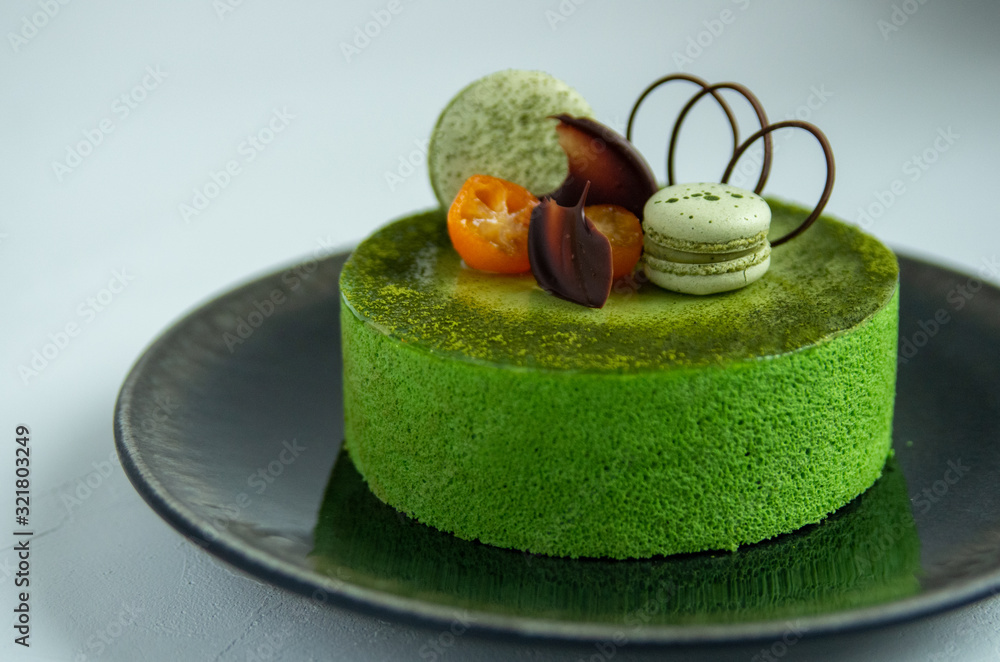 抹茶のホールケーキ 金柑のコンポートとチョコレートのトッピング Stock Photo Adobe Stock 抹茶のホールケーキ 金柑のコンポートとチョコレートのトッピング Stock Photo Adobe Stock
