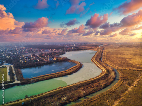 Aerial sunset landscape of the Dambovita River close to Morii Lake , Bucharest, Romania