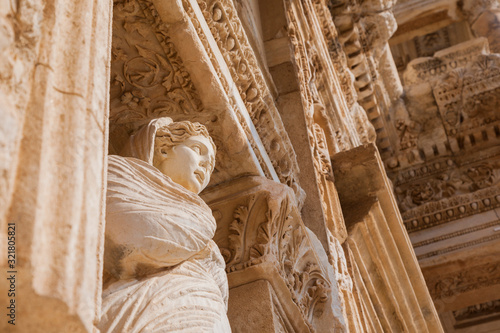 Figurine in Library of Celsus, ruins of ancient city Ephesus