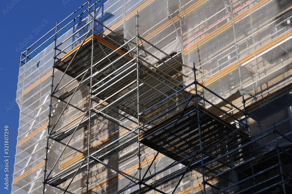 scaffold and safety net at a building