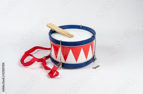 Marching drum with sticks photo