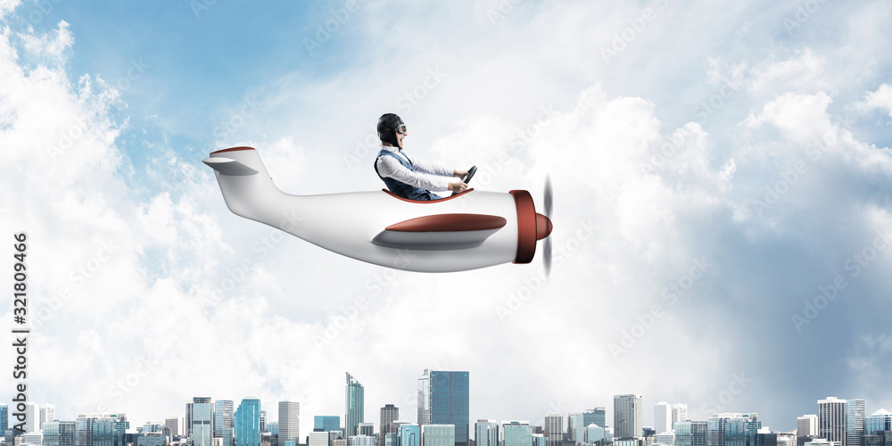 Businessman in aviator hat and goggles Businessman in aviator hat and goggles