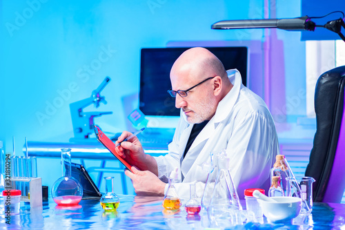 Researcher records the resu...