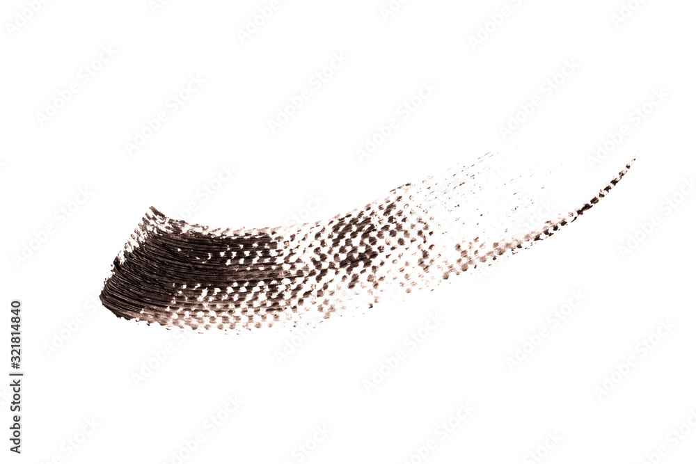 Black mascara texture on a white background. Black mascara texture on a white background.