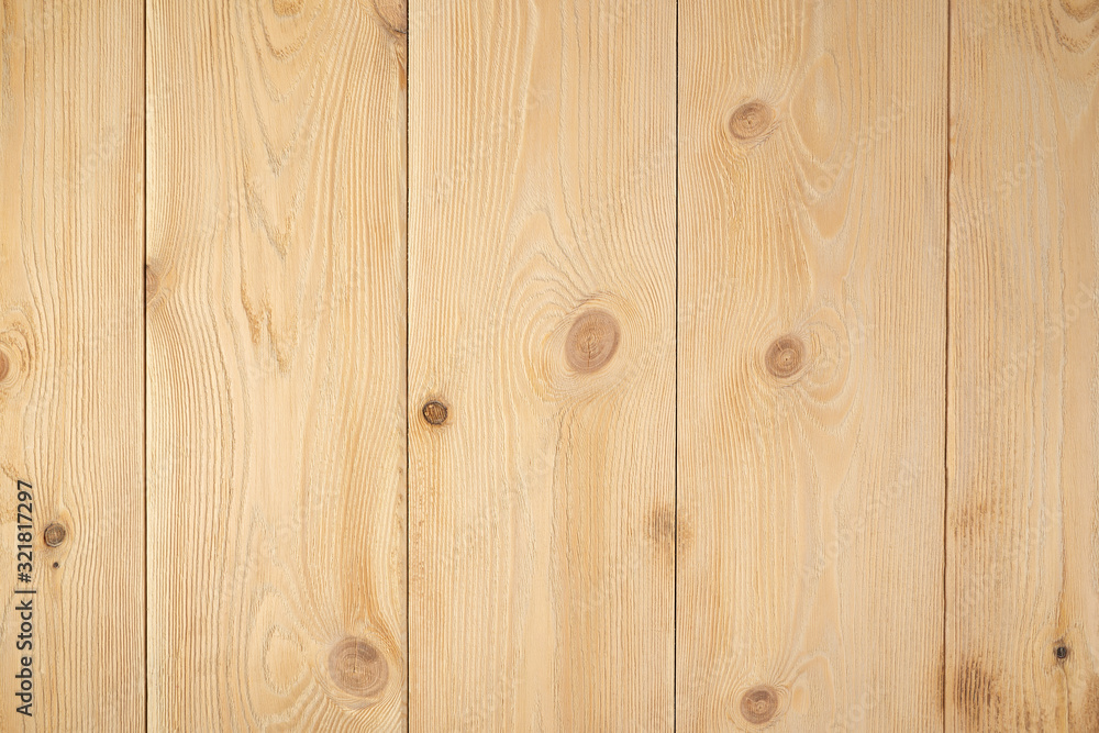 Naklejka premium Background made of natural light beige wood, with texture elements.
