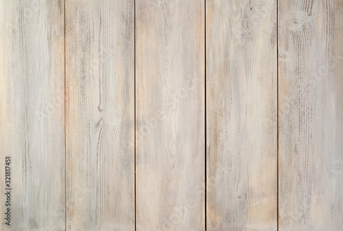 Background made of natural light beige wood, with texture elements.