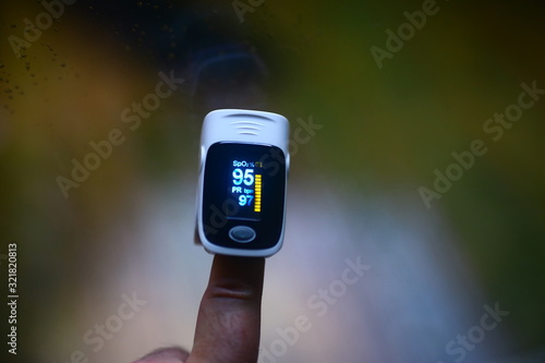 Puls oximeter showing oxygen saturation and heart rate