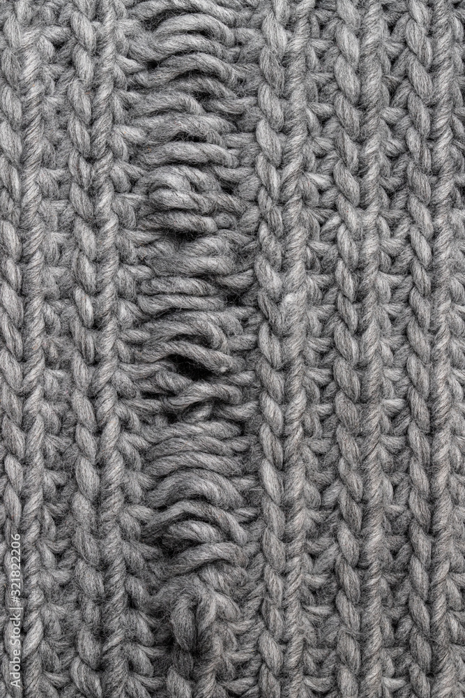 Light grey knitting texture with manufacturing defect isolated on white Light grey knitting texture with manufacturing defect isolated on white