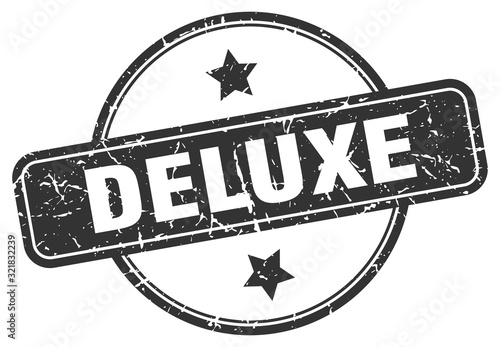deluxe stamp. deluxe round vintage grunge sign. deluxe