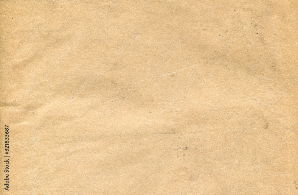 texture of old paper in yellow hue texture of old paper in yellow hue
