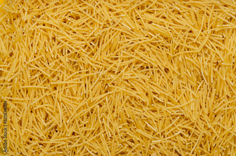 Pasta textured background for menu, website, postcard, decoration. Traditional Italian Raw Durum Wheat Pasta Pasta textured background for menu, website, postcard, decoration. Traditional Italian Raw Durum Wheat Pasta