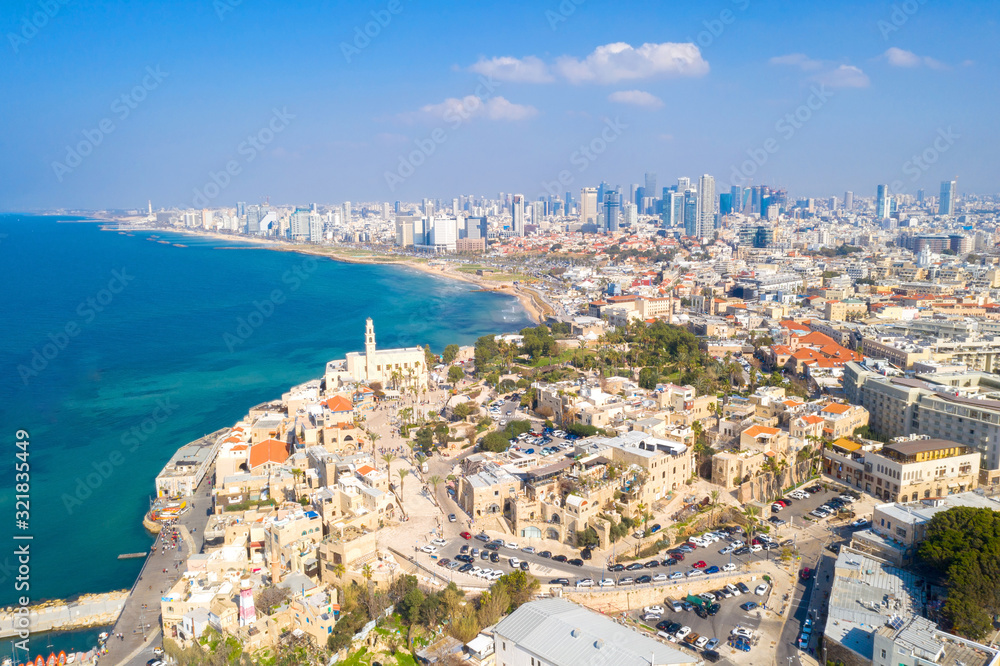 Panoramic view of The old city port of Jaffa with modern Tel Aviv skyline in the background.