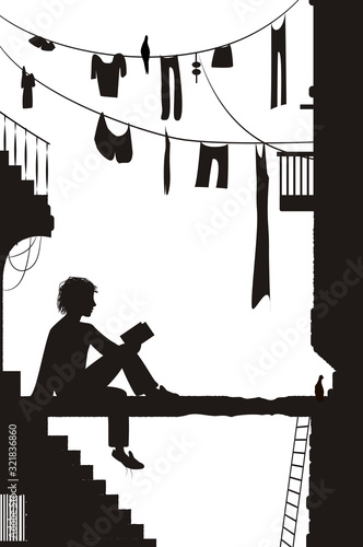 dreamer, boy sits near the city houses and reads the book, reading in the old town scene in black and white color, city story