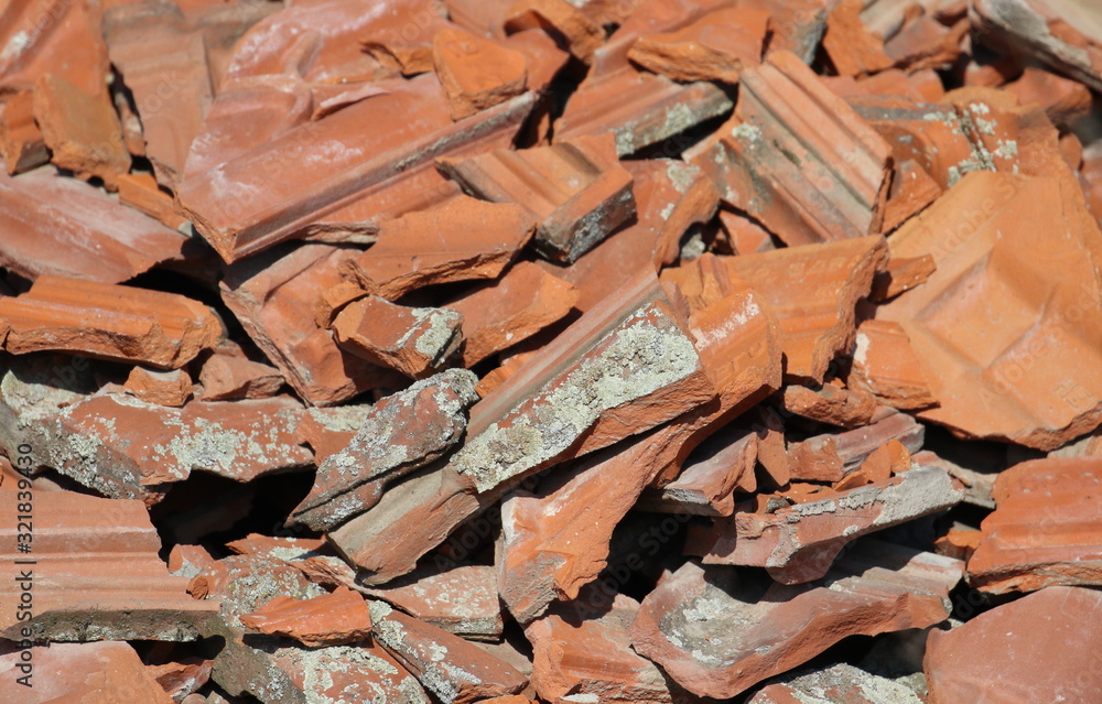 Broken brick and tile, detail construction and demolition debris at construction site background and texture Broken brick and tile, detail construction and demolition debris at construction site background and texture