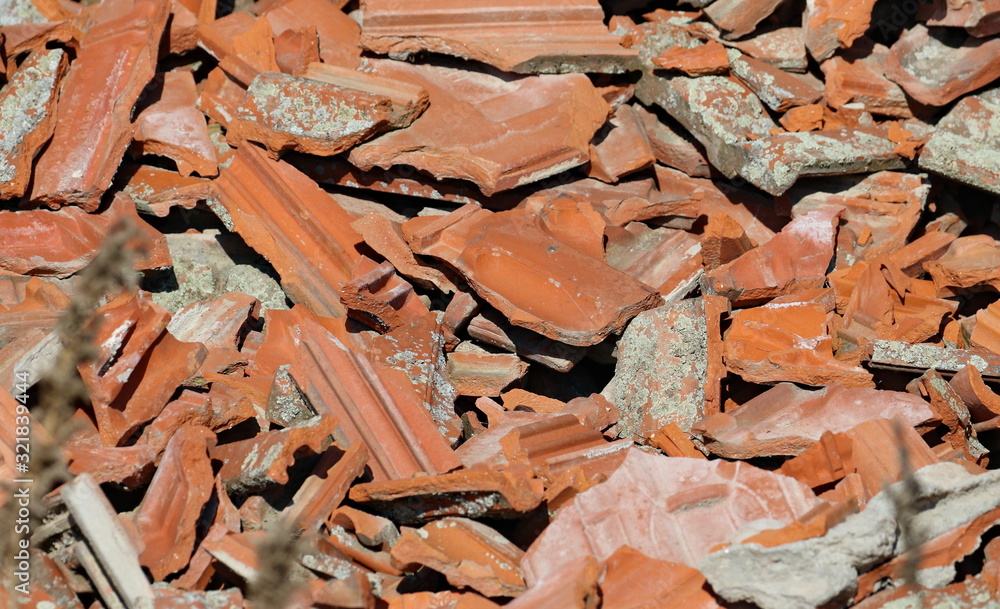Broken brick and tile, detail construction and demolition debris at construction site background and texture Broken brick and tile, detail construction and demolition debris at construction site background and texture