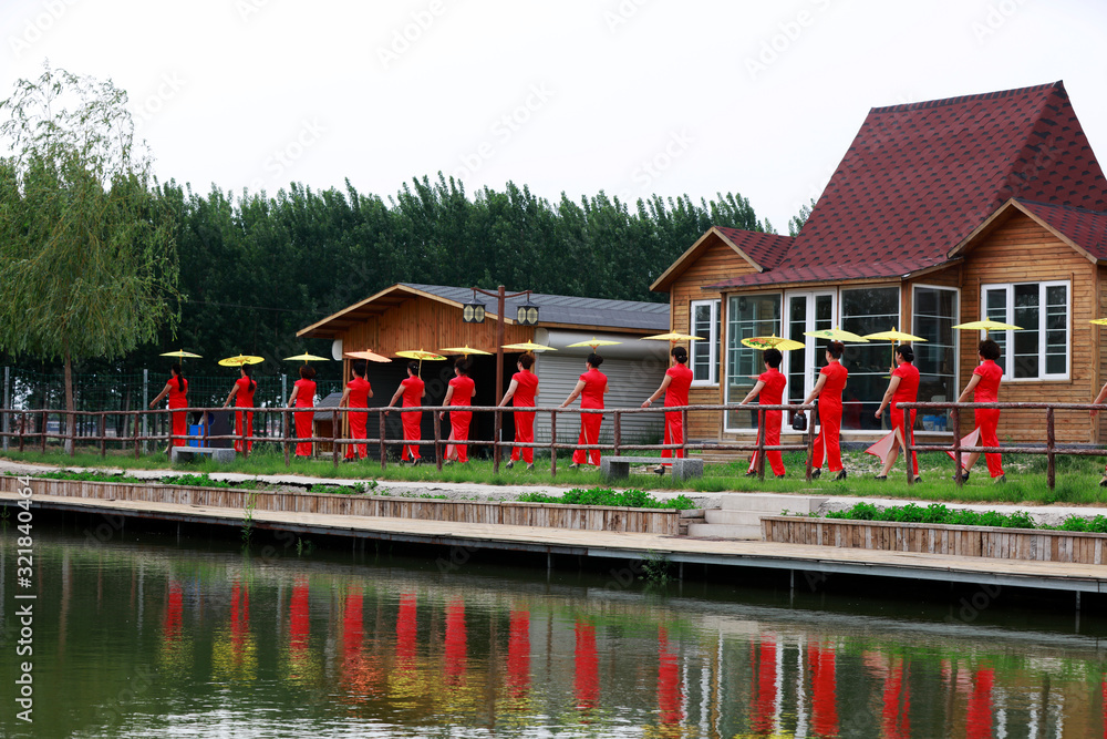 Chinese traditional cheongsam shows in the park, Luannan County, Hebei Province, China