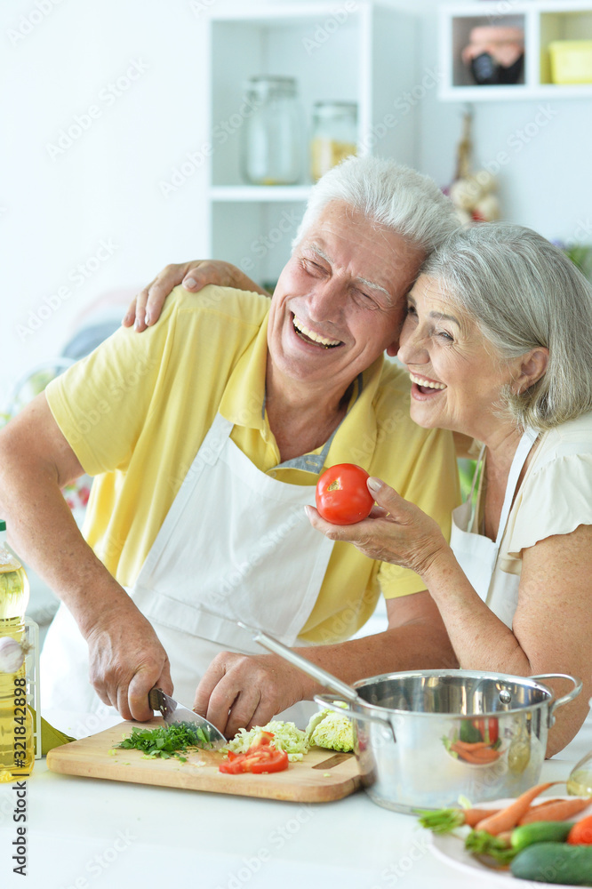 Close up portrait of senior couple cooking Close up portrait of senior couple cooking