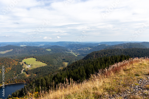 Scenic view at landscape and lake Feldsee from Feldberg, Black Forest in autumn with multi colored vegetation © Reiner