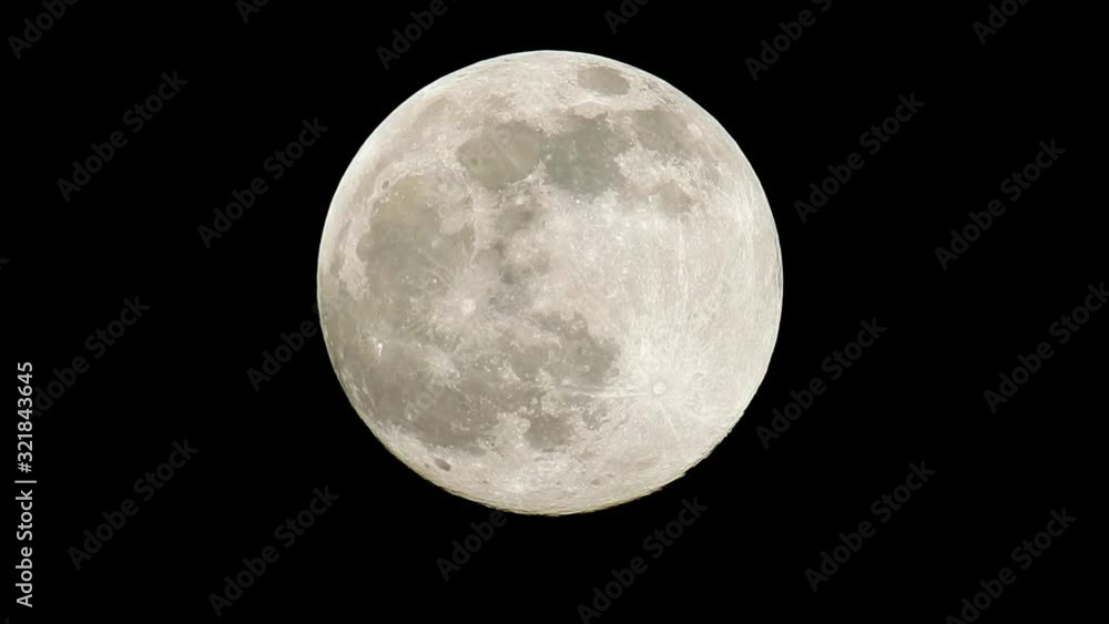 Rising full supermoon in perigee on a dark and cloudless nightsky in February, also called the snowmoon. Rising full supermoon in perigee on a dark and cloudless nightsky in February, also called the snowmoon.