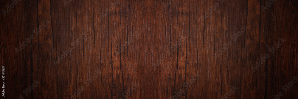 Seamless dark brown wooden board texture background with vignette Seamless dark brown wooden board texture background with vignette