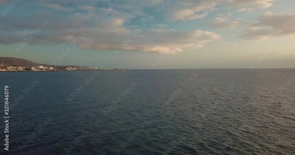 Rotating aerial drone clip over the Atlantic Ocean in Tenerife/ Canary Islands heading to a coastal village Rotating aerial drone clip over the Atlantic Ocean in Tenerife/ Canary Islands heading to a coastal village