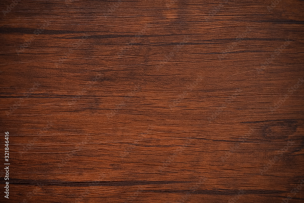 Seamless dark brown wooden board texture background with vignette Seamless dark brown wooden board texture background with vignette