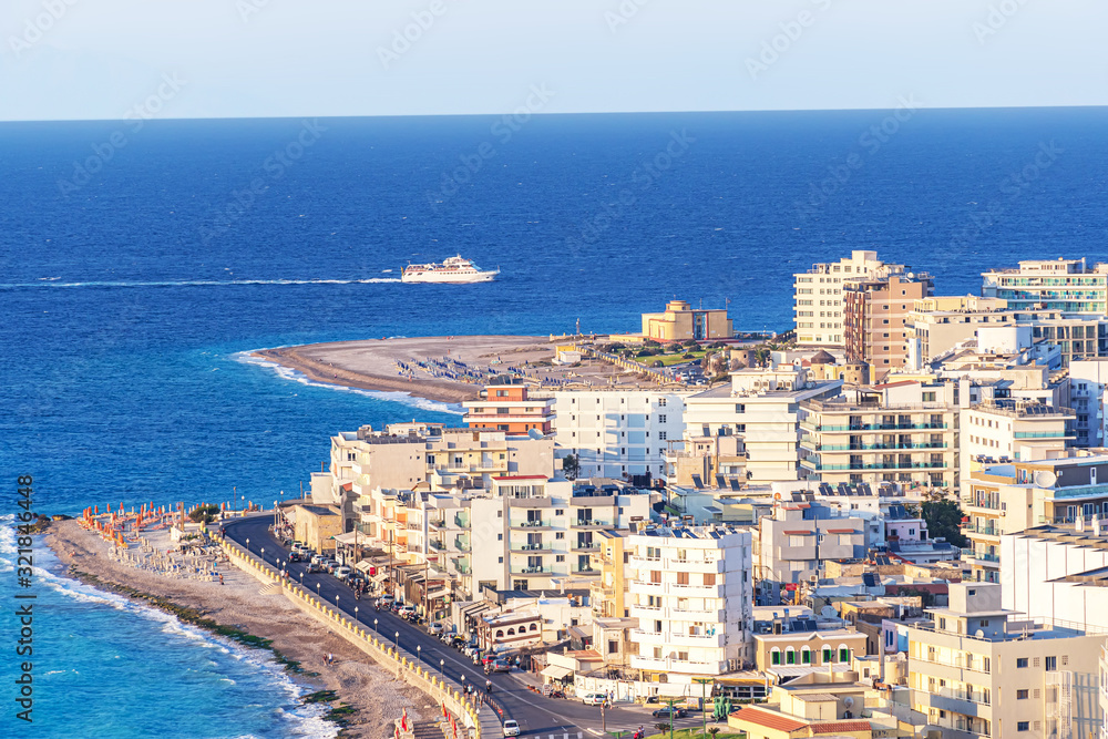 Naklejka premium View of Aegean Sea round city of Rhodes, small ship on sea (Rhodes, Greece)