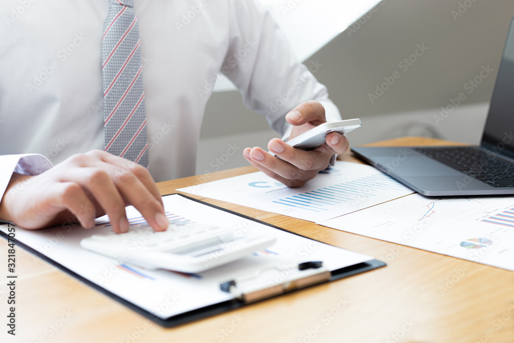 Businessmen use graphs to summarize results and calculate income-expenses to find financial balance points and use them to improve and advance business, finance and economic concepts. Businessmen use graphs to summarize results and calculate income-expenses to find financial balance points and use them to improve and advance business, finance and economic concepts.