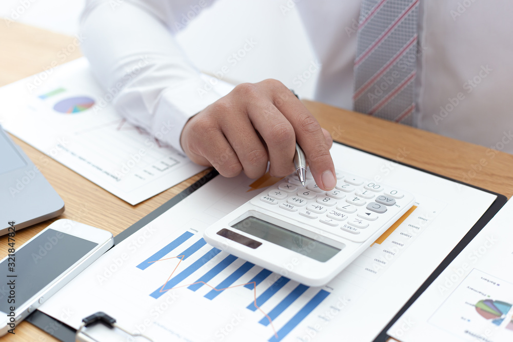 Businessmen use graphs to summarize results and calculate income-expenses to find financial balance points and use them to improve and advance business, finance and economic concepts. Businessmen use graphs to summarize results and calculate income-expenses to find financial balance points and use them to improve and advance business, finance and economic concepts.