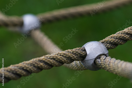 Φωτογραφία The concept of connecting teams and the connected groups as ropes tied and linked together like an unbreakable chain, business trust metaphor linking partners for teamwork support and strength