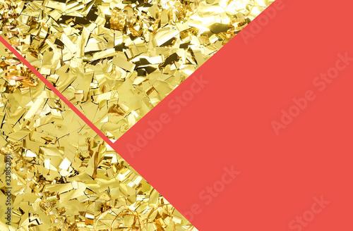 Decorative composition background for Birthday, Valentine's Day, Black Friday, Christmas and Happy New Year. Shining gold with tinsel confetti and coral background. Top view, copy space for your text