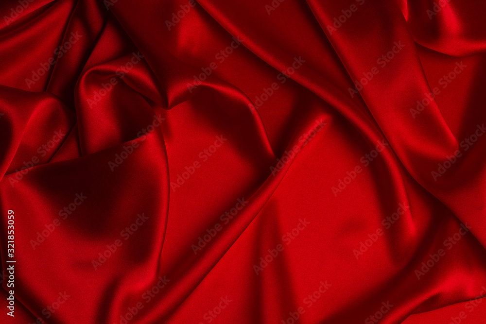 Red silk or satin luxury fabric texture can use as abstract background. Red silk or satin luxury fabric texture can use as abstract background.
