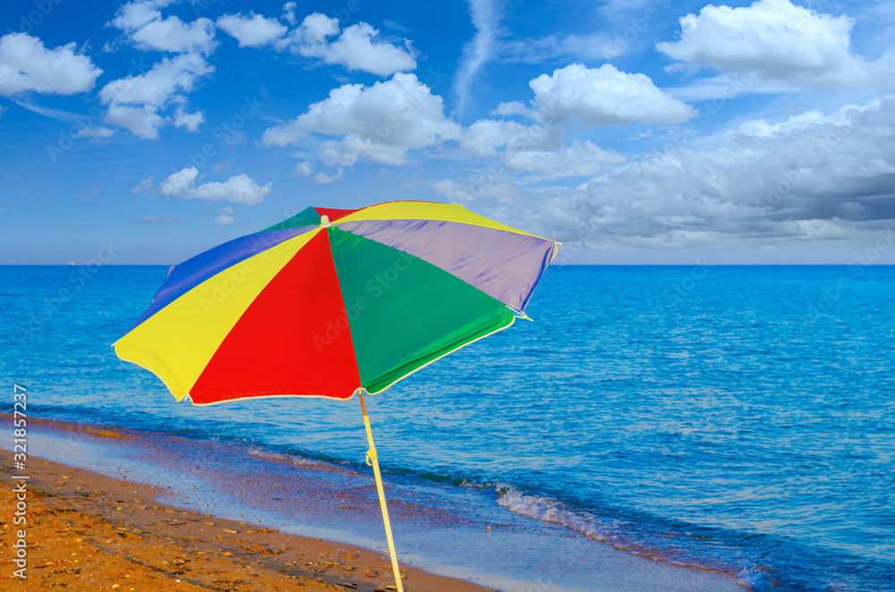 Colored beach umbrella on the beach.