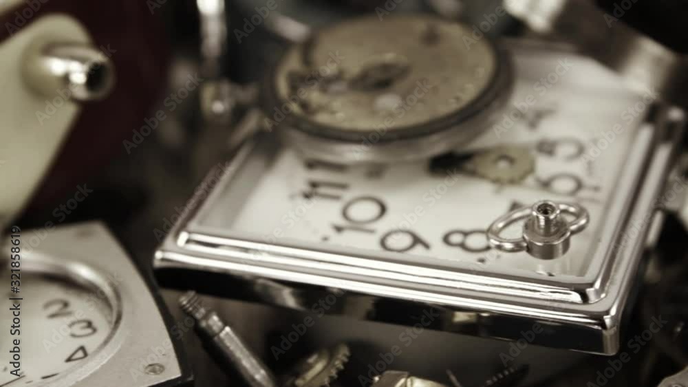 Vintage mechanical watch, alarm clock and various clock details Stock