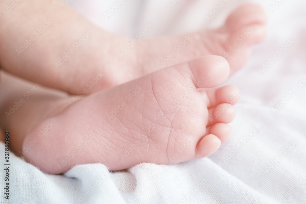 Closeup baby's foot with copy space Closeup baby's foot with copy space