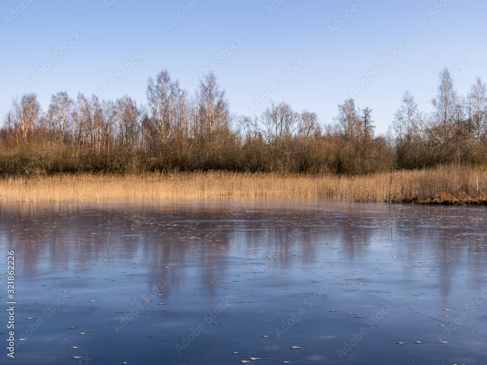 winter landscape with frozen lake