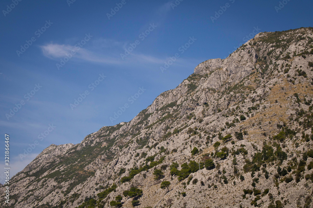 Mountains against the blue sky . Mountains in Montenegro. Selective focus.
