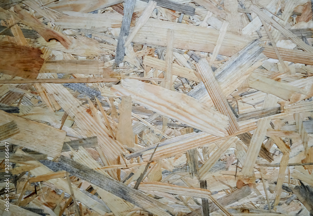 Abstract raw material recyclable sawdust background, light brown wooden texture Abstract raw material recyclable sawdust background, light brown wooden texture