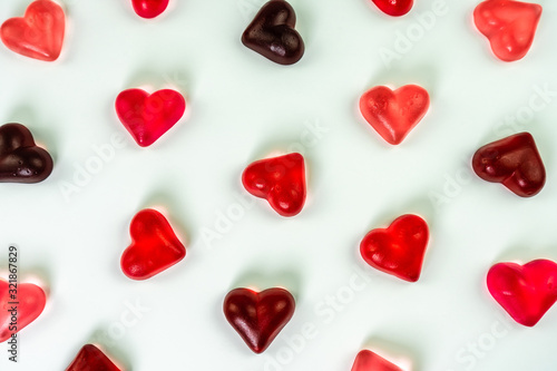 Heart shaped jelly candies on white background © OLGA