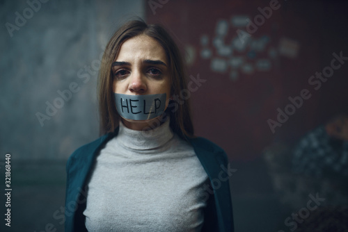 Victim with her mouth taped shut, kidnapping photo