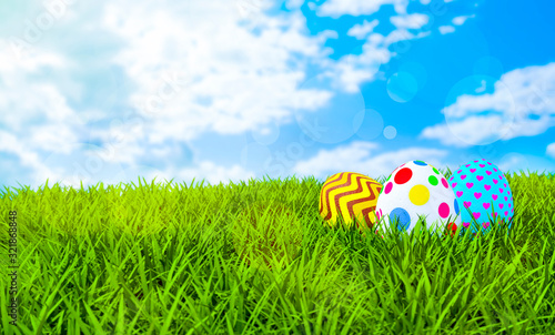 Happy easter eggs on grass and blue sky